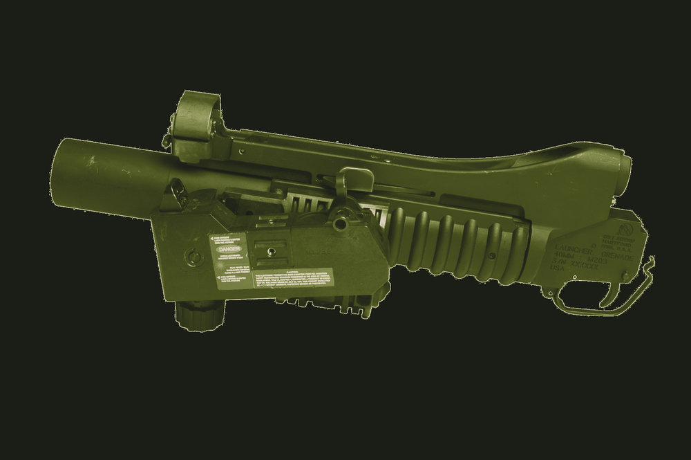 M203