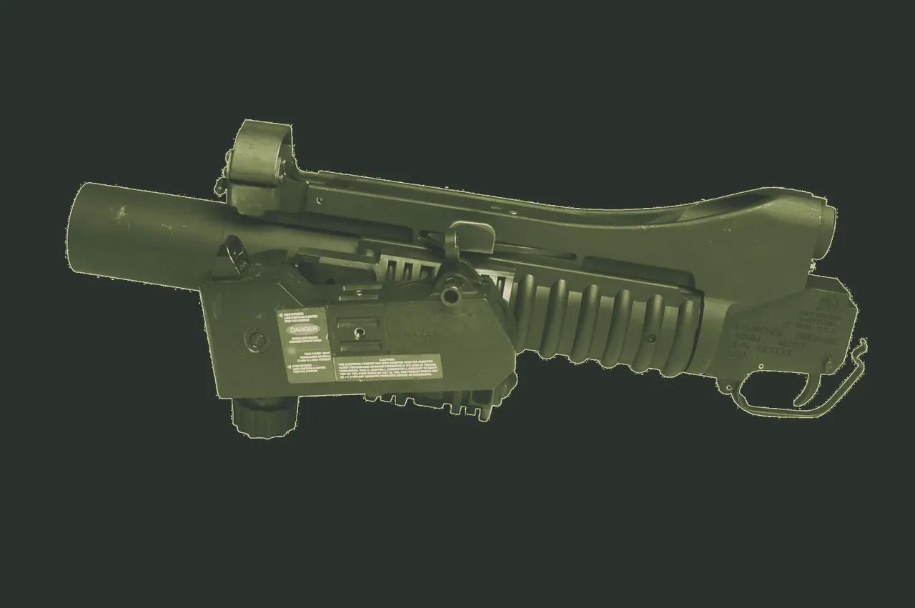 M203
